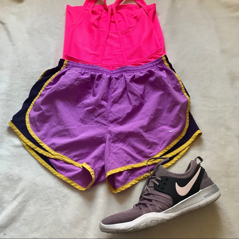 Nike purple and yellow running shorts